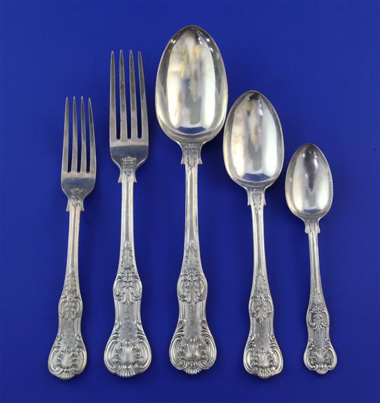 A matched part canteen of Victorian silver double struck Queens pattern flatware, 129 oz.